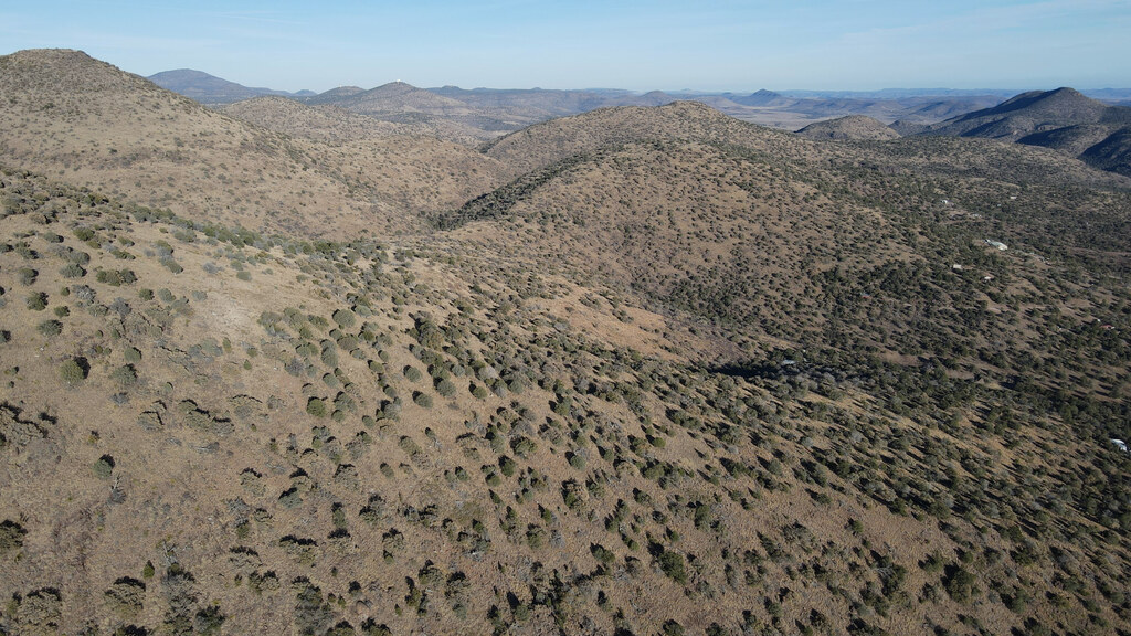 Aerial view across rounded Davis Mountains ridges
